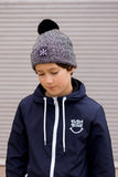 Alphabet Soup Beanie - Cross Bones Pom