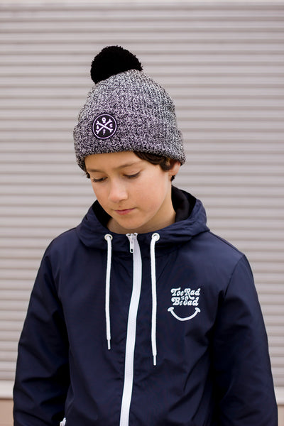 Alphabet Soup Beanie - Cross Bones Pom